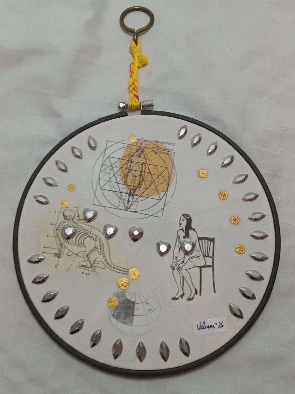 Handmade prints of old magazines on cotton & mixed media in a cross-stitch hoop